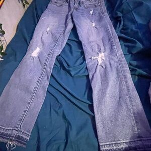 Women's Distressed Blue Jeans